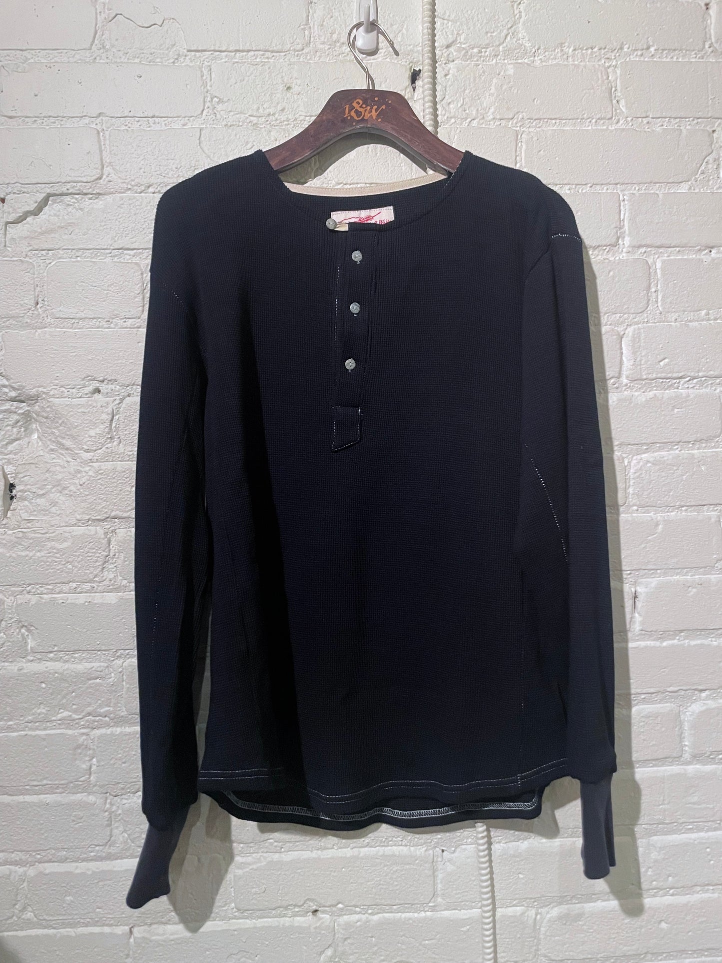 Made in Canada, the Navy Micro Waffle Vintage Heritage Henley from 18 Waits, a sustainable menswear brand known for vintage-inspired style and rock and roll fashion—an Imogene and Willie alternative focused on quality and character.